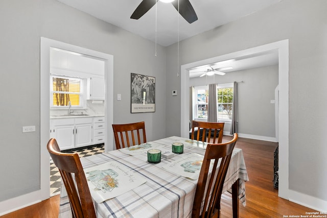 942 Mcilvaine, San Antonio, TX 78201 - dining area featuring a ceiling fan, wood finished floors, and baseboards