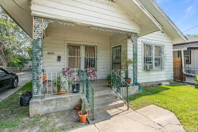 2606 W Travis St, San Antonio, TX 78207 - entrance to property with covered porch and cooling unit