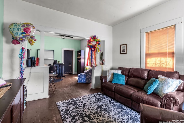 2606 W Travis St, San Antonio, TX 78207 - living room with a ceiling fan and dark wood-type flooring