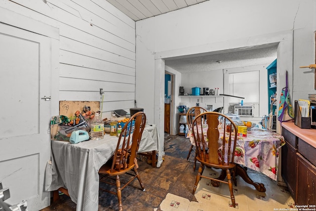 2606 W Travis St, San Antonio, TX 78207 - dining space featuring wooden walls
