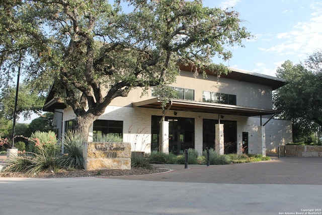 355 Donella, Hollywood Park, TX 78232 - view of front of house featuring stone siding