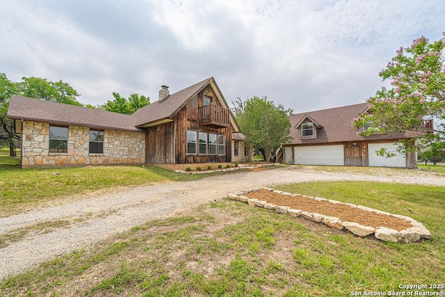 1 Carolyn Ln, Boerne, TX 78006 - view of front of property featuring dirt driveway, a chimney, a front lawn, and stone siding
