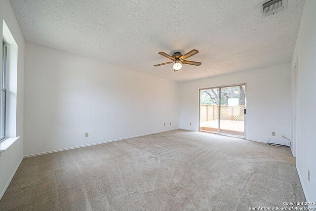 1 Carolyn Ln, Boerne, TX 78006 - carpeted spare room featuring a ceiling fan, a textured ceiling, and baseboards