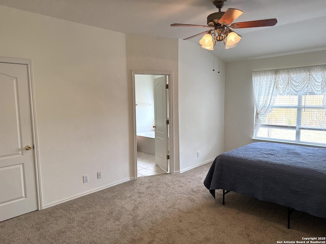 8002 Wever Xing, San Antonio, TX 78250 - bedroom with carpet, ensuite bath, a ceiling fan, and baseboards