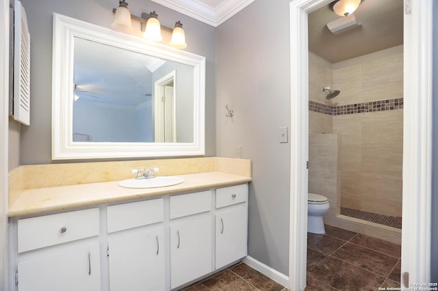 2834 Burning Log, San Antonio, TX 78247 - full bathroom with crown molding, tiled shower, toilet, vanity, and tile patterned floors