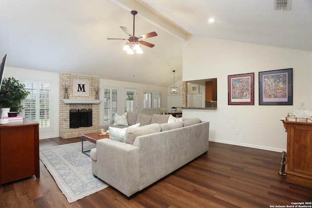 2834 Burning Log, San Antonio, TX 78247 - living room featuring ceiling fan, baseboards, a brick fireplace, beam ceiling, and dark wood-style flooring