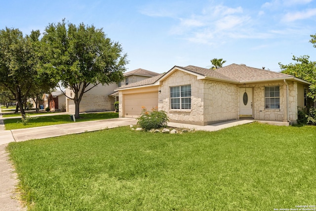 3628 Tilden, New Braunfels, TX 78132 - view of front of property with stone siding, concrete driveway, an attached garage, and a front yard