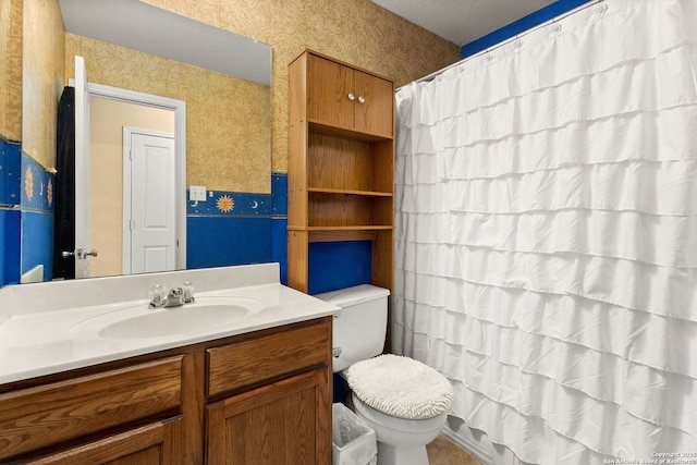 3628 Tilden, New Braunfels, TX 78132 - full bath with wallpapered walls, toilet, vanity, and a shower with curtain
