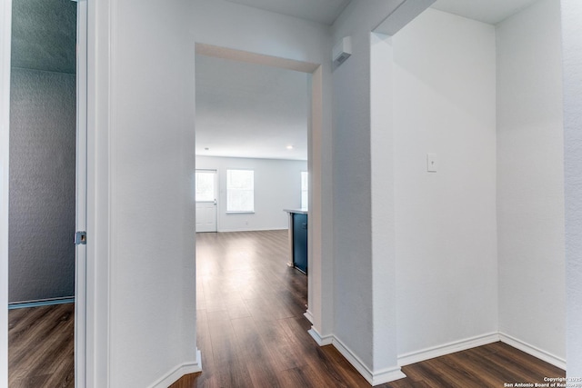 5518 Salado Fls, San Antonio, TX 78222 - corridor featuring dark wood-style flooring and baseboards