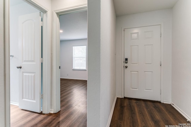 5518 Salado Fls, San Antonio, TX 78222 - hall with dark wood-type flooring and baseboards