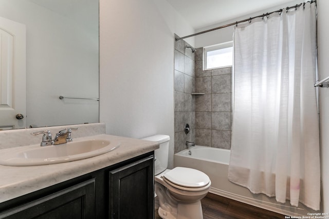 5518 Salado Fls, San Antonio, TX 78222 - bathroom with toilet, vanity, shower / tub combo, and wood finished floors