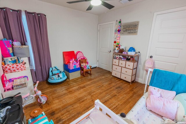 507 Twin Elm, Canyon Lake, TX 78133 - bedroom with wood finished floors and a ceiling fan