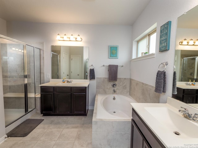 4926 Drifter Oaks, Saint Hedwig, TX 78152 - full bath featuring a shower stall, two vanities, a garden tub, and tile patterned flooring
