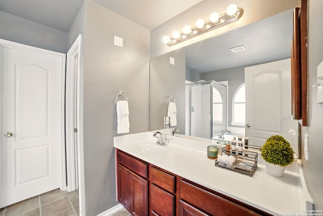 16910 Graham Walk, San Antonio, TX 78247 - bathroom featuring vanity, a stall shower, tile patterned floors, and a bath