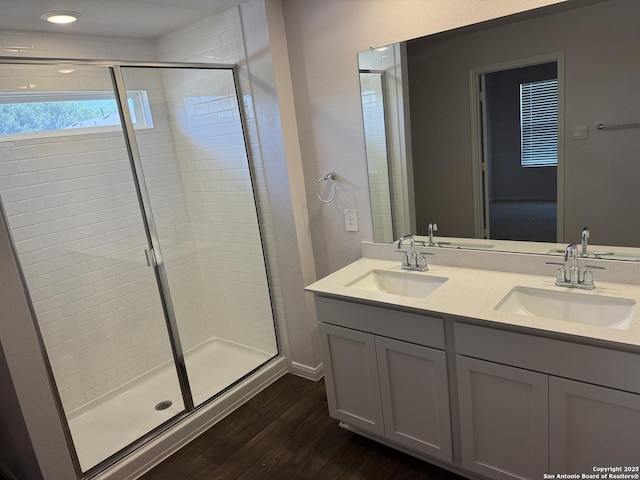322 Addison, Lockhart, TX 78644 - full bath featuring a stall shower, wood finished floors, and double vanity
