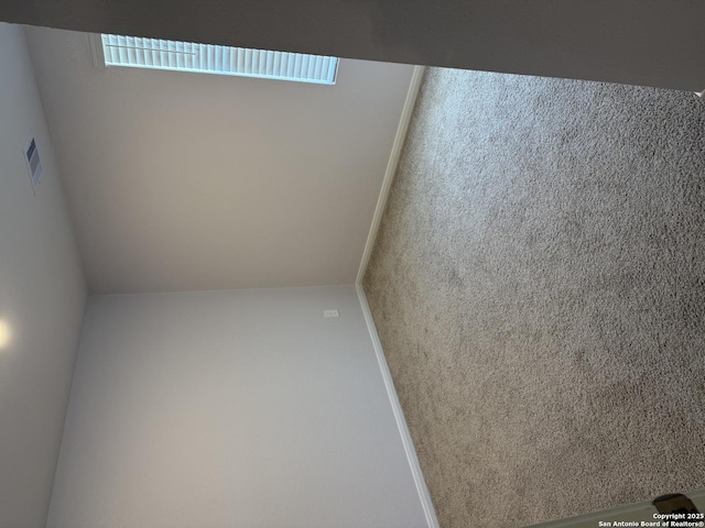 322 Addison, Lockhart, TX 78644 - unfurnished room featuring plenty of natural light and carpet flooring