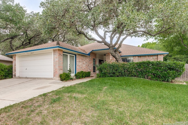 8763 Silent Oaks, San Antonio, TX 78250 - single story home with an attached garage, concrete driveway, brick siding, and a front yard