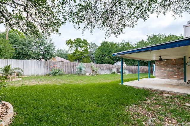 8763 Silent Oaks, San Antonio, TX 78250 - view of yard featuring a patio and a ceiling fan