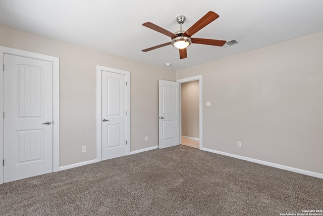 2523 W Kings Hwy, San Antonio, TX 78228 - unfurnished bedroom featuring carpet, baseboards, and ceiling fan