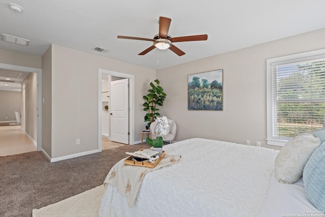 2523 W Kings Hwy, San Antonio, TX 78228 - carpeted bedroom featuring baseboards, attic access, and a ceiling fan
