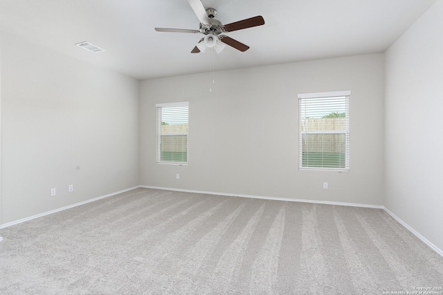 14647 Stirrup Trce, Elmendorf, TX 78112 - carpeted empty room featuring a ceiling fan and baseboards