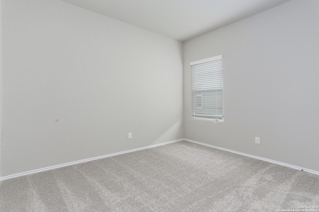 14647 Stirrup Trce, Elmendorf, TX 78112 - carpeted empty room featuring baseboards