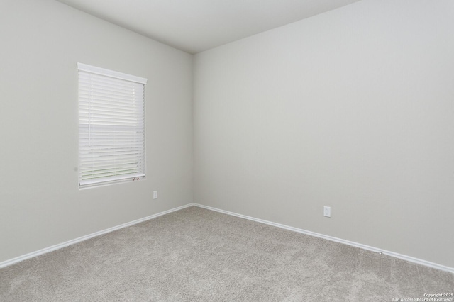 14647 Stirrup Trce, Elmendorf, TX 78112 - spare room with light carpet and baseboards