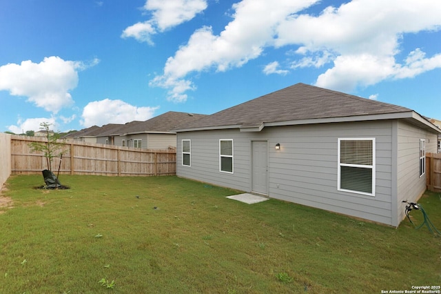 14647 Stirrup Trce, Elmendorf, TX 78112 - rear view of house with a shingled roof