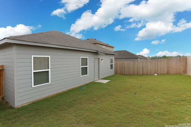 14647 Stirrup Trce, Elmendorf, TX 78112 - back of house with roof with shingles