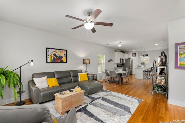 419 Channing Ave, San Antonio, TX 78210 - living room with a ceiling fan, baseboards, recessed lighting, and light wood finished floors