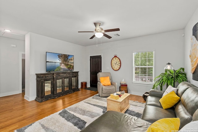 419 Channing Ave, San Antonio, TX 78210 - living room featuring a ceiling fan and wood finished floors