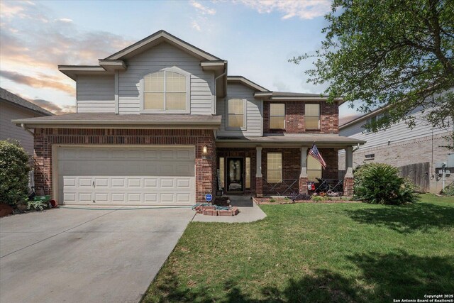 404 Eagle Flight, Cibolo, TX 78108 - traditional-style house featuring brick siding, covered porch, driveway, a yard, and an attached garage