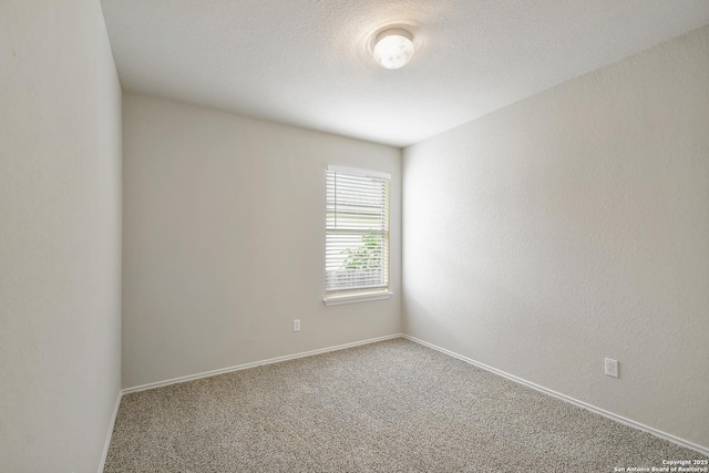 10374 Oakwood Crst, San Antonio, TX 78245 - carpeted empty room with baseboards