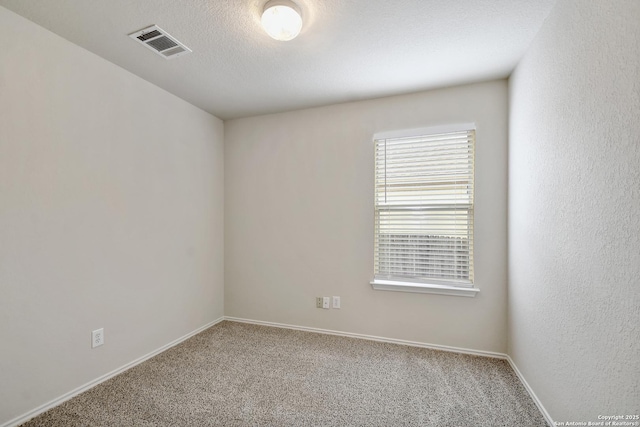 10374 Oakwood Crst, San Antonio, TX 78245 - carpeted empty room with baseboards