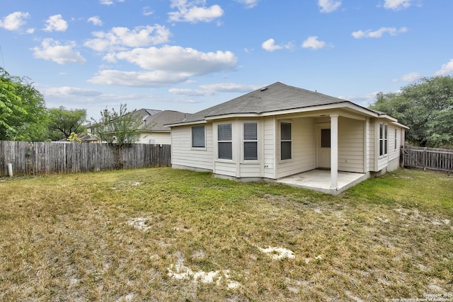 10374 Oakwood Crst, San Antonio, TX 78245 - rear view of house with a patio and roof with shingles