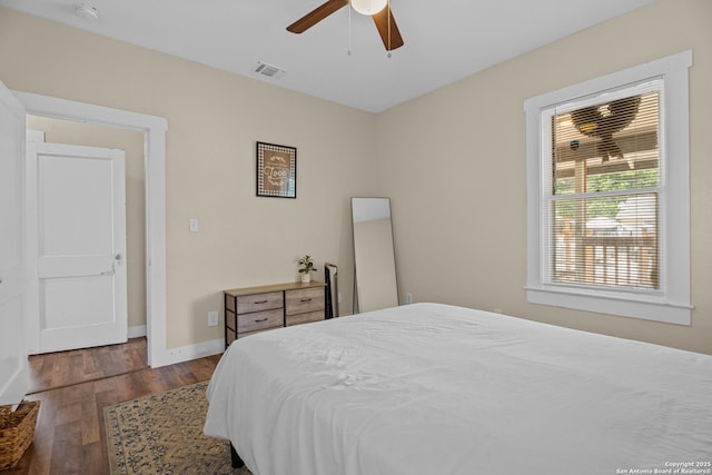 1726 Center, San Antonio, TX 78202 - bedroom with wood finished floors, baseboards, and a ceiling fan