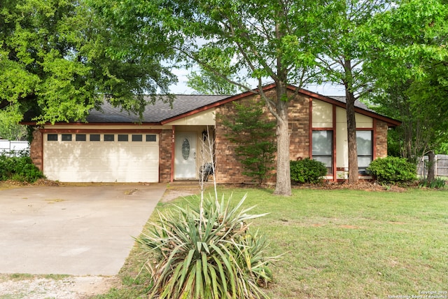 120 Westridge Dr, Springtown, TX 76082 - view of front facade with concrete driveway, roof with shingles, brick siding, and a garage