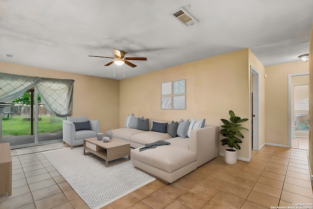 120 Westridge Dr, Springtown, TX 76082 - living room with light tile patterned floors, ceiling fan, and plenty of natural light