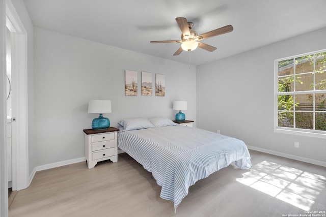 97 Denton, San Antonio, TX 78213 - bedroom with light wood-type flooring, baseboards, and a ceiling fan