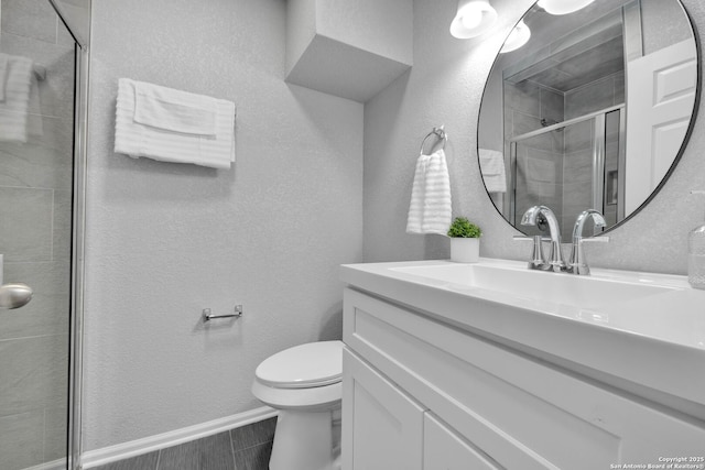 97 Denton, San Antonio, TX 78213 - full bathroom with a shower stall, toilet, vanity, and baseboards