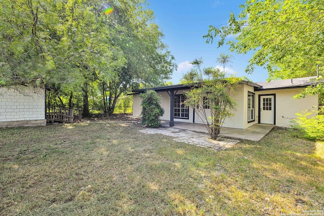 97 Denton, San Antonio, TX 78213 - view of green lawn featuring a patio area