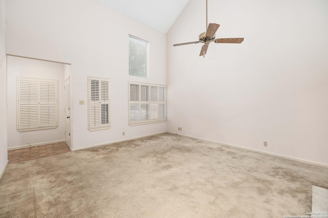 8103 N New Braunfels Unit 19, San Antonio, TX 78209 - empty room featuring high vaulted ceiling, carpet flooring, ceiling fan, and baseboards