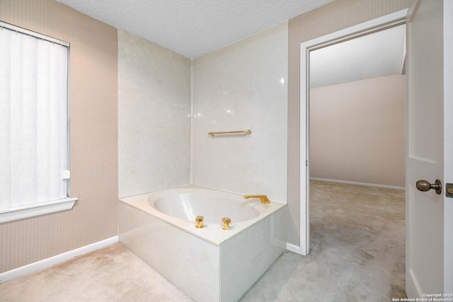 8103 N New Braunfels Unit 19, San Antonio, TX 78209 - full bath with baseboards, a textured ceiling, and a garden tub