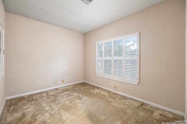 8103 N New Braunfels Unit 19, San Antonio, TX 78209 - carpeted empty room featuring baseboards and a textured ceiling