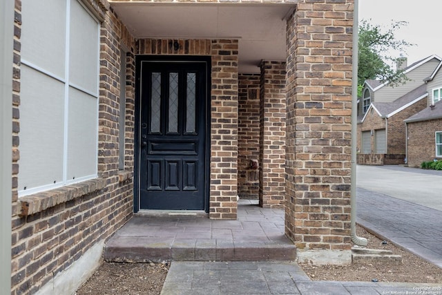 8103 N New Braunfels Unit 19, San Antonio, TX 78209 - view of exterior entry with brick siding