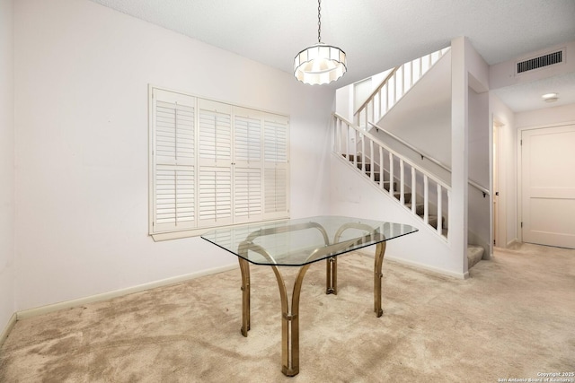 8103 N New Braunfels Unit 19, San Antonio, TX 78209 - unfurnished dining area with stairs, carpet floors, and baseboards