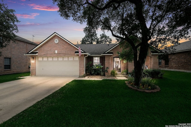 8022 Maddie Ln, San Antonio, TX 78255 - ranch-style house with an attached garage, driveway, a front lawn, and brick siding