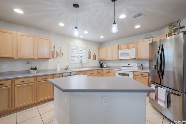 8022 Maddie Ln, San Antonio, TX 78255 - kitchen featuring appliances with stainless steel finishes, light brown cabinetry, light tile patterned floors, a sink, and recessed lighting