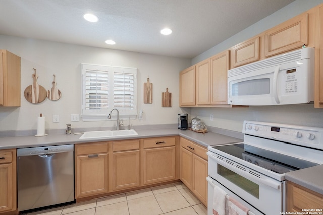 8022 Maddie Ln, San Antonio, TX 78255 - kitchen with white appliances, a sink, light brown cabinets, light tile patterned floors, and recessed lighting