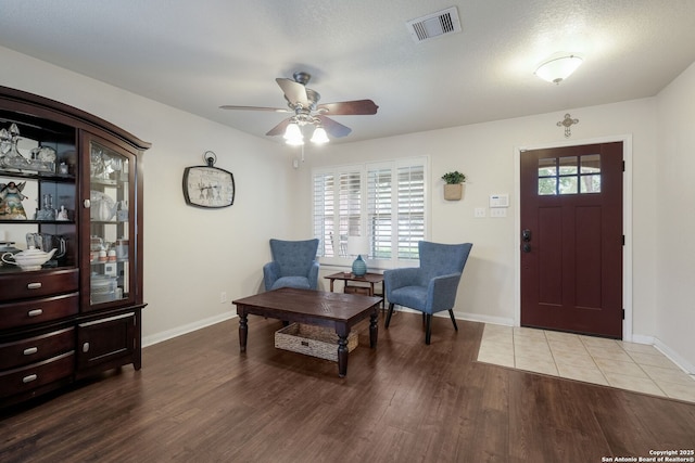 8022 Maddie Ln, San Antonio, TX 78255 - entryway featuring wood finished floors, a ceiling fan, and baseboards